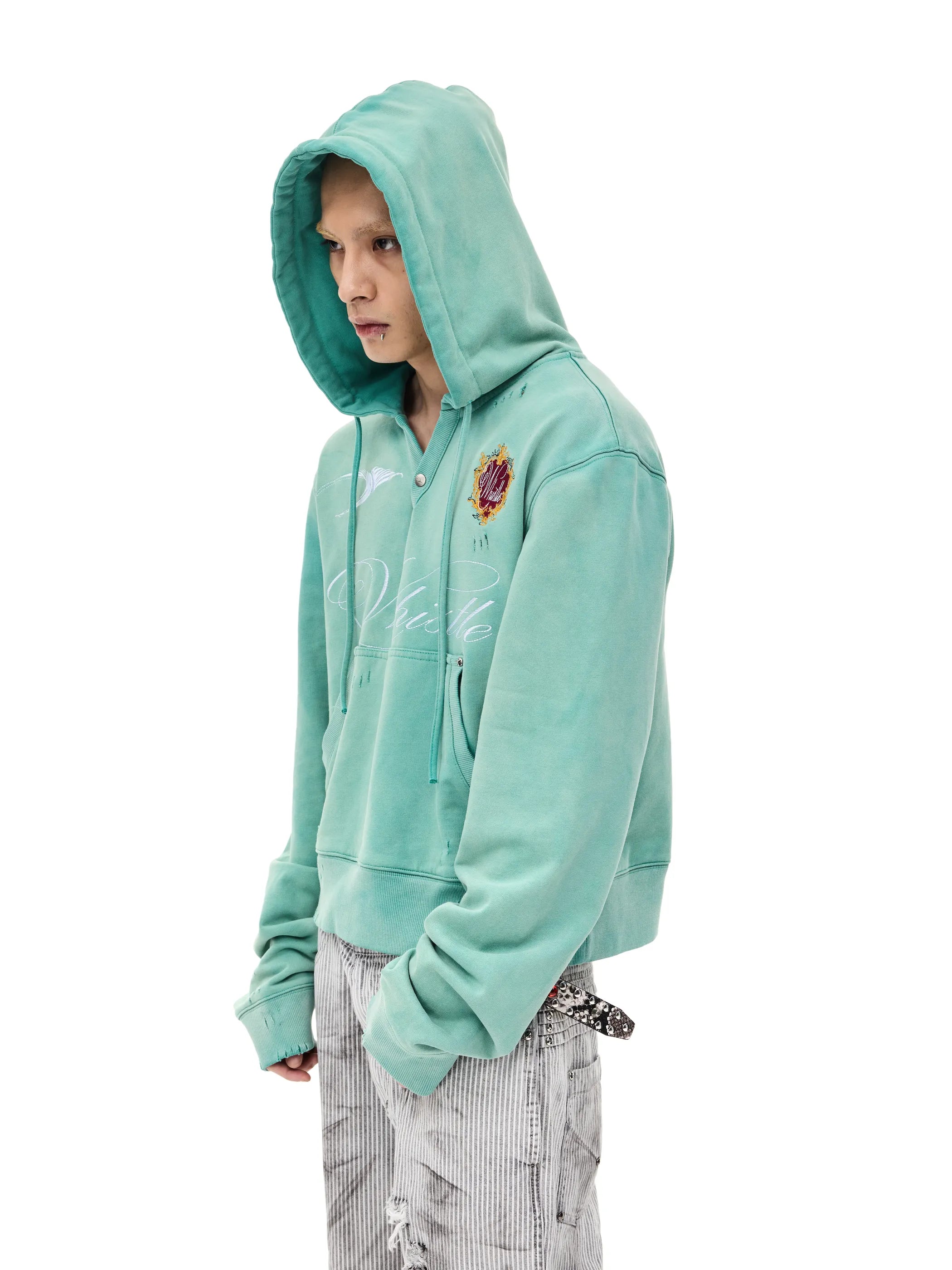 Distressed embroidered hooded sweatshirt
