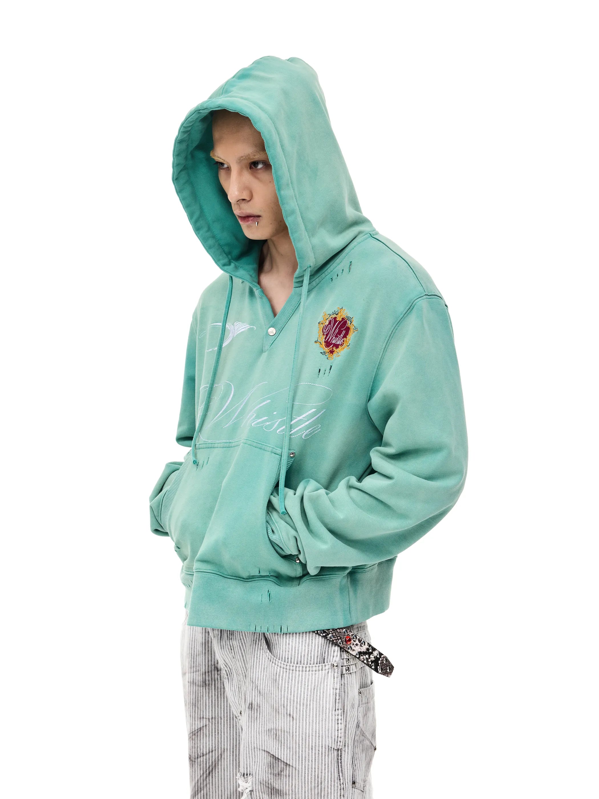Distressed embroidered hooded sweatshirt