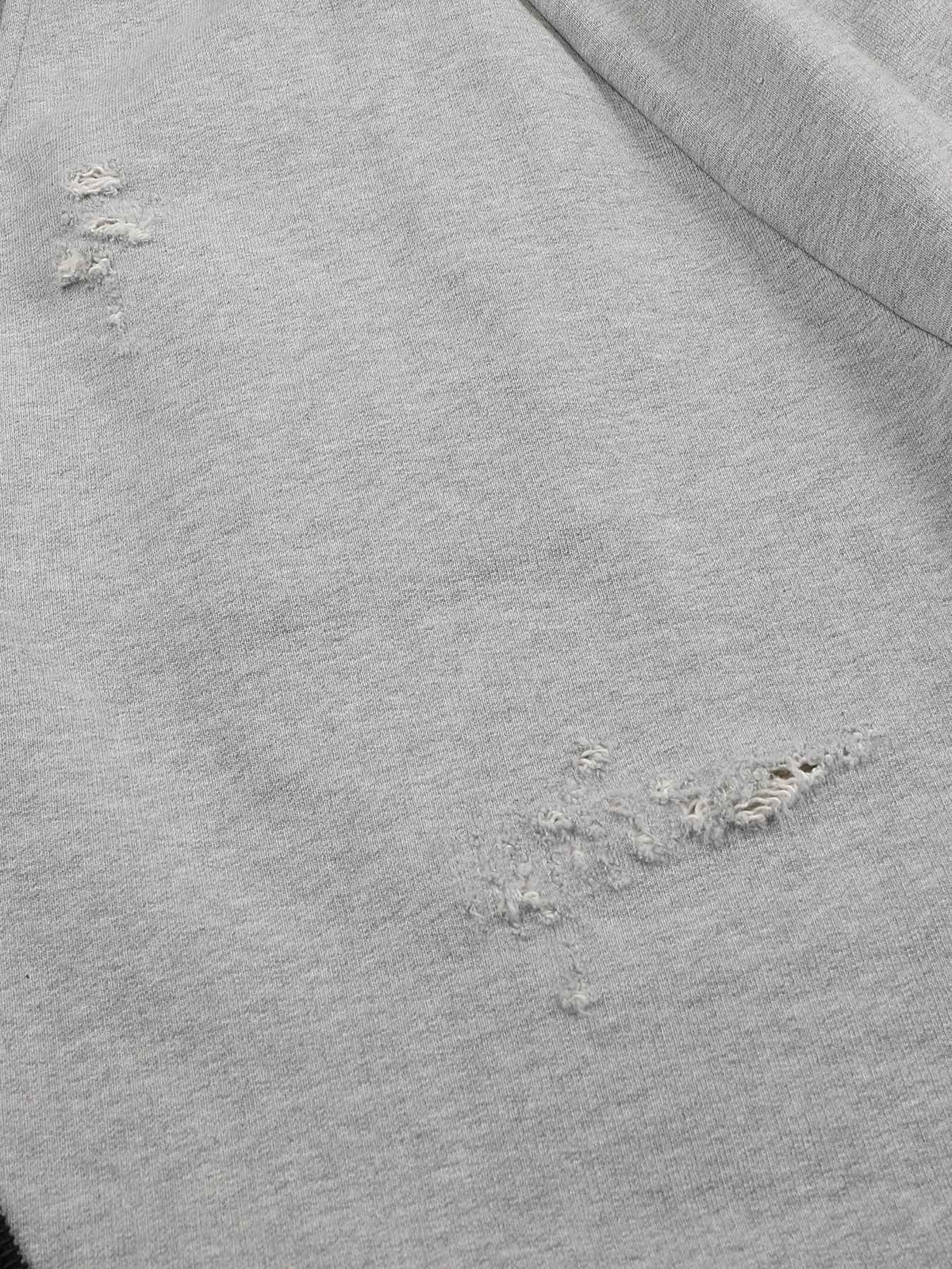Napoleon-style distressed sweatpants