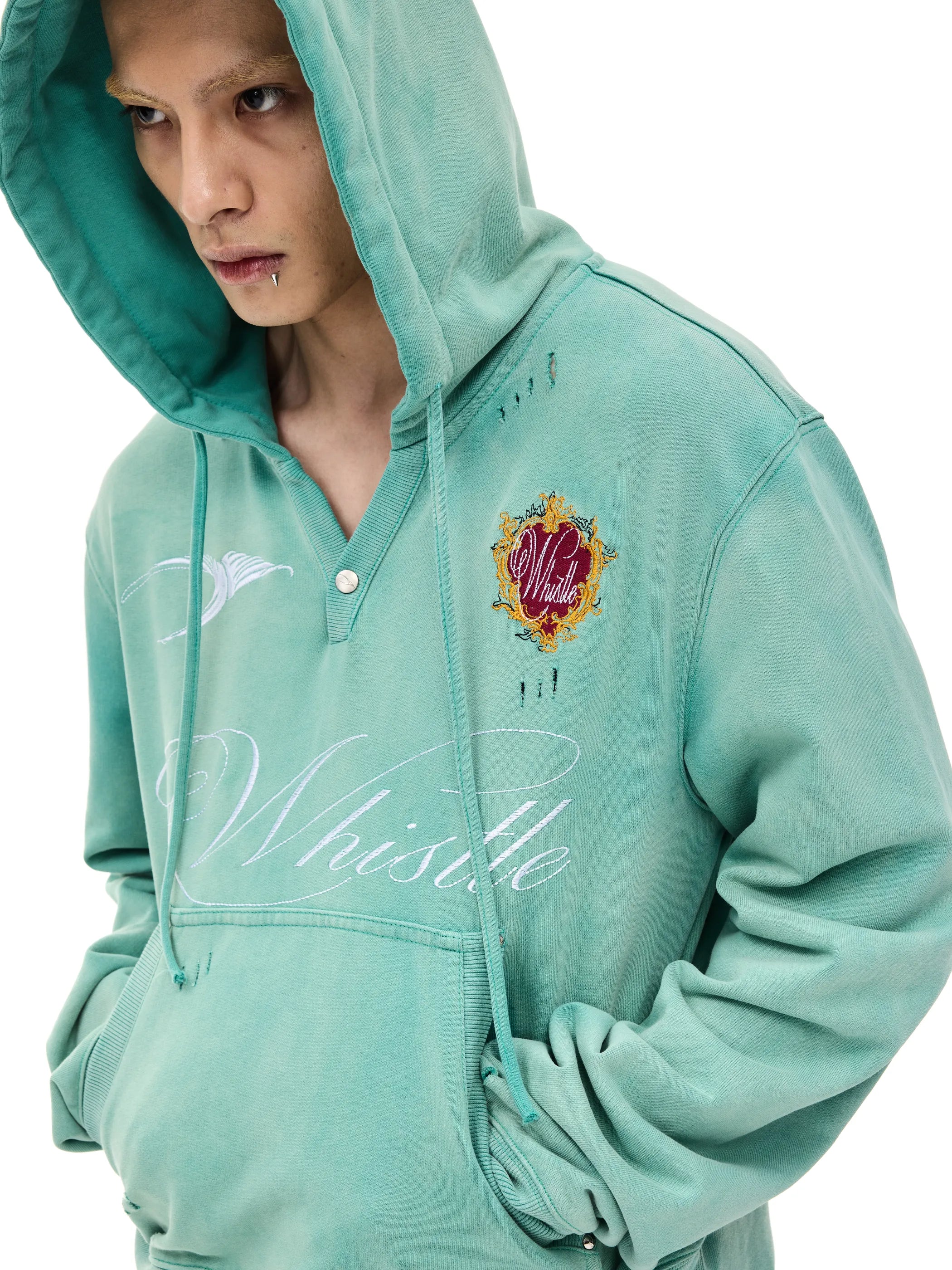 Distressed embroidered hooded sweatshirt