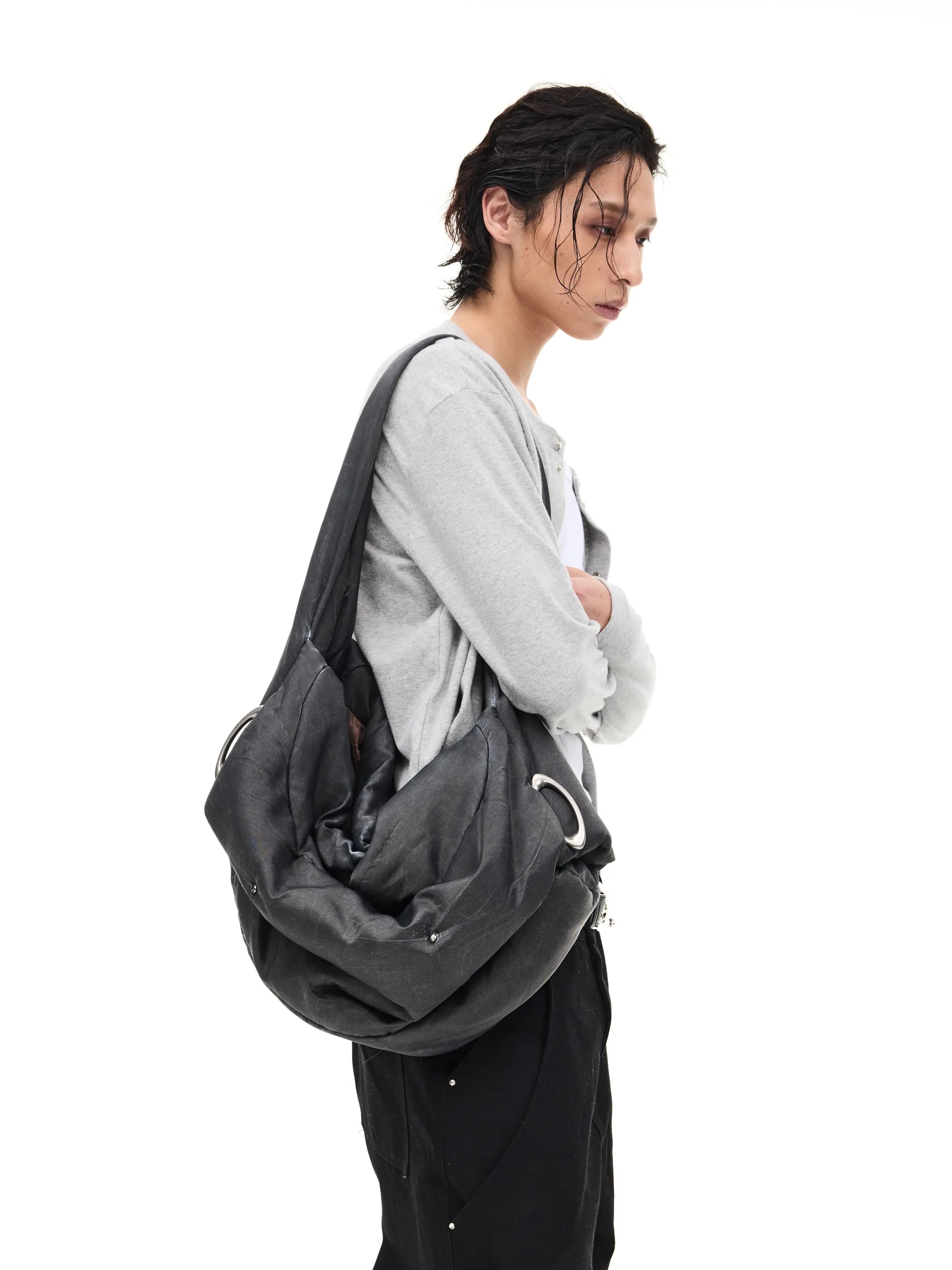 Transformable quilted crossbody bag