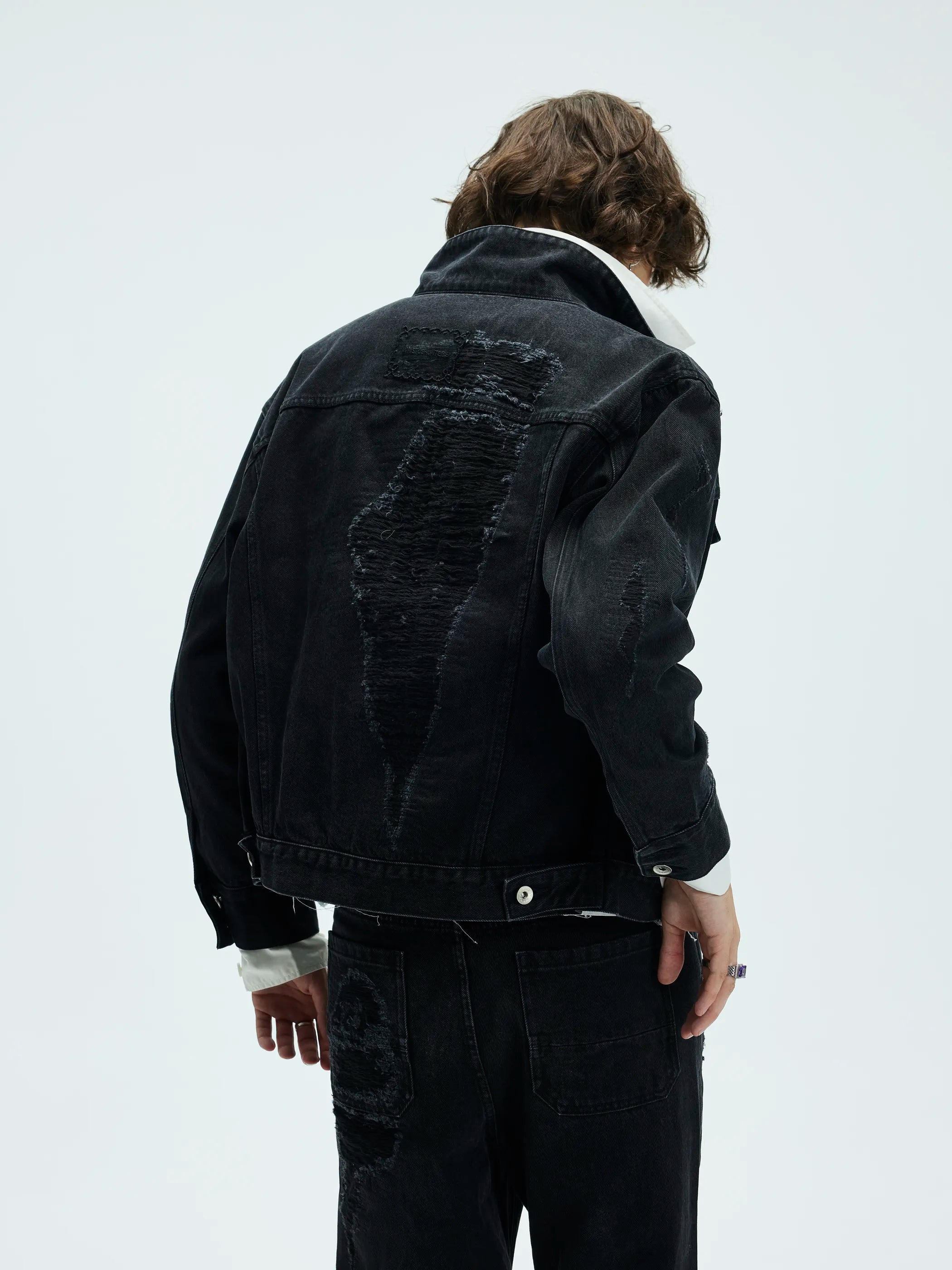Model shot of Distressed Washed Denim Jacket 5
