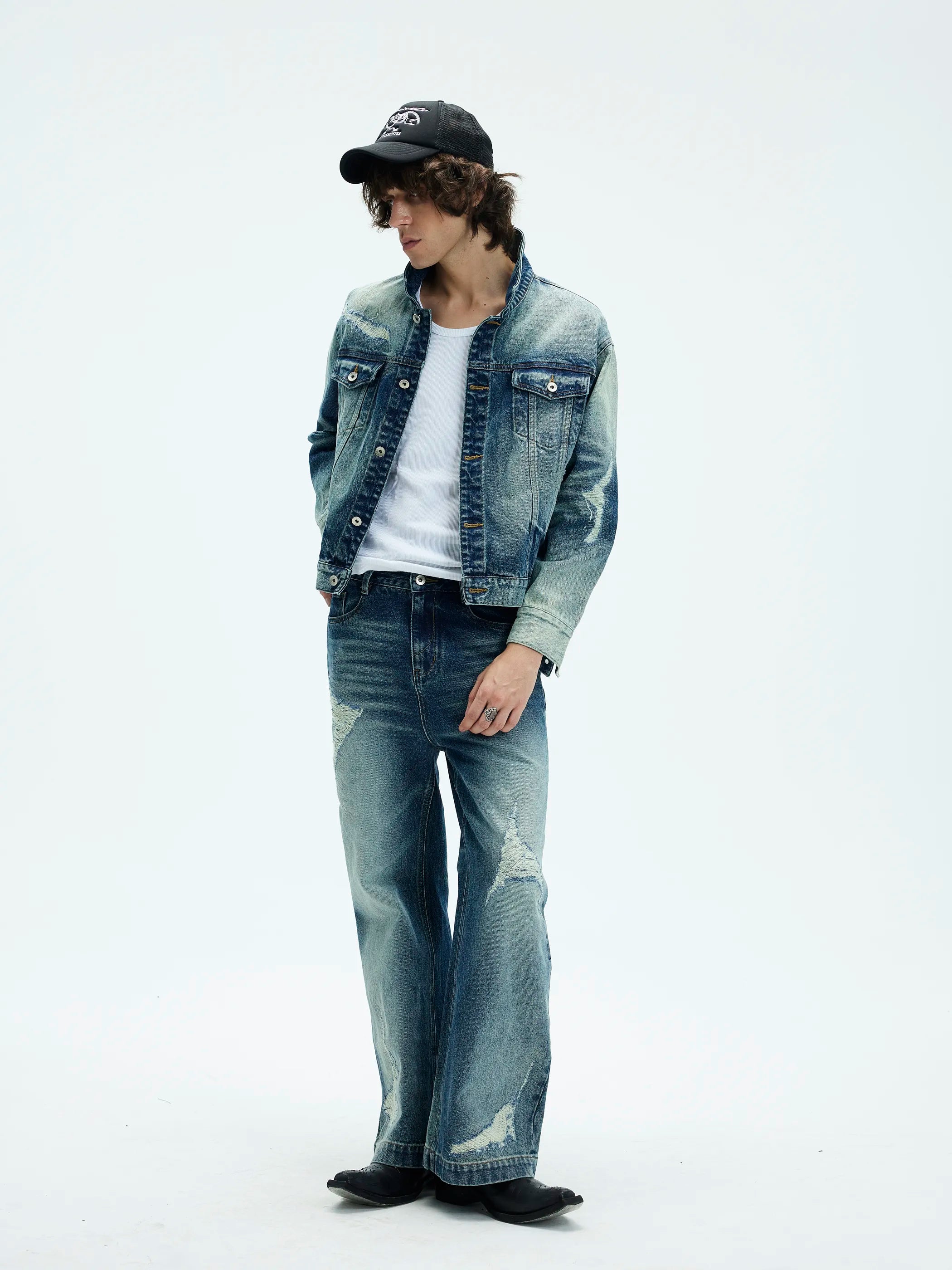 Model shot of Distressed Washed Denim Jacket 5