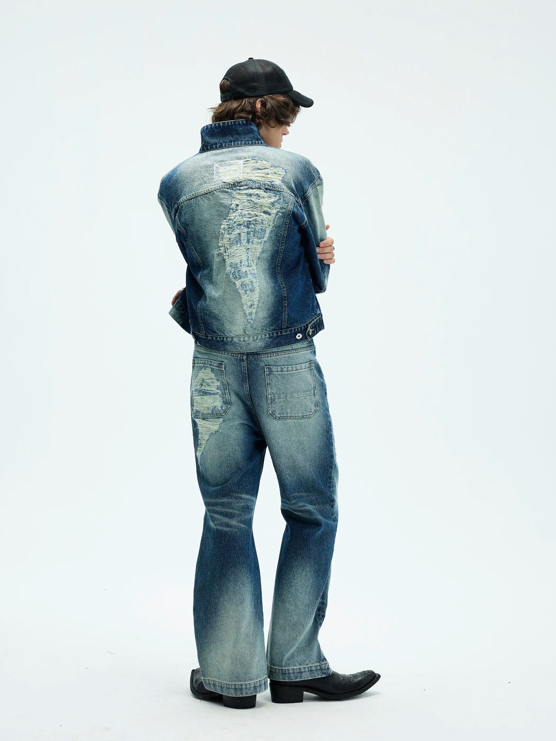 Model shot of Distressed Washed Denim Jacket 6