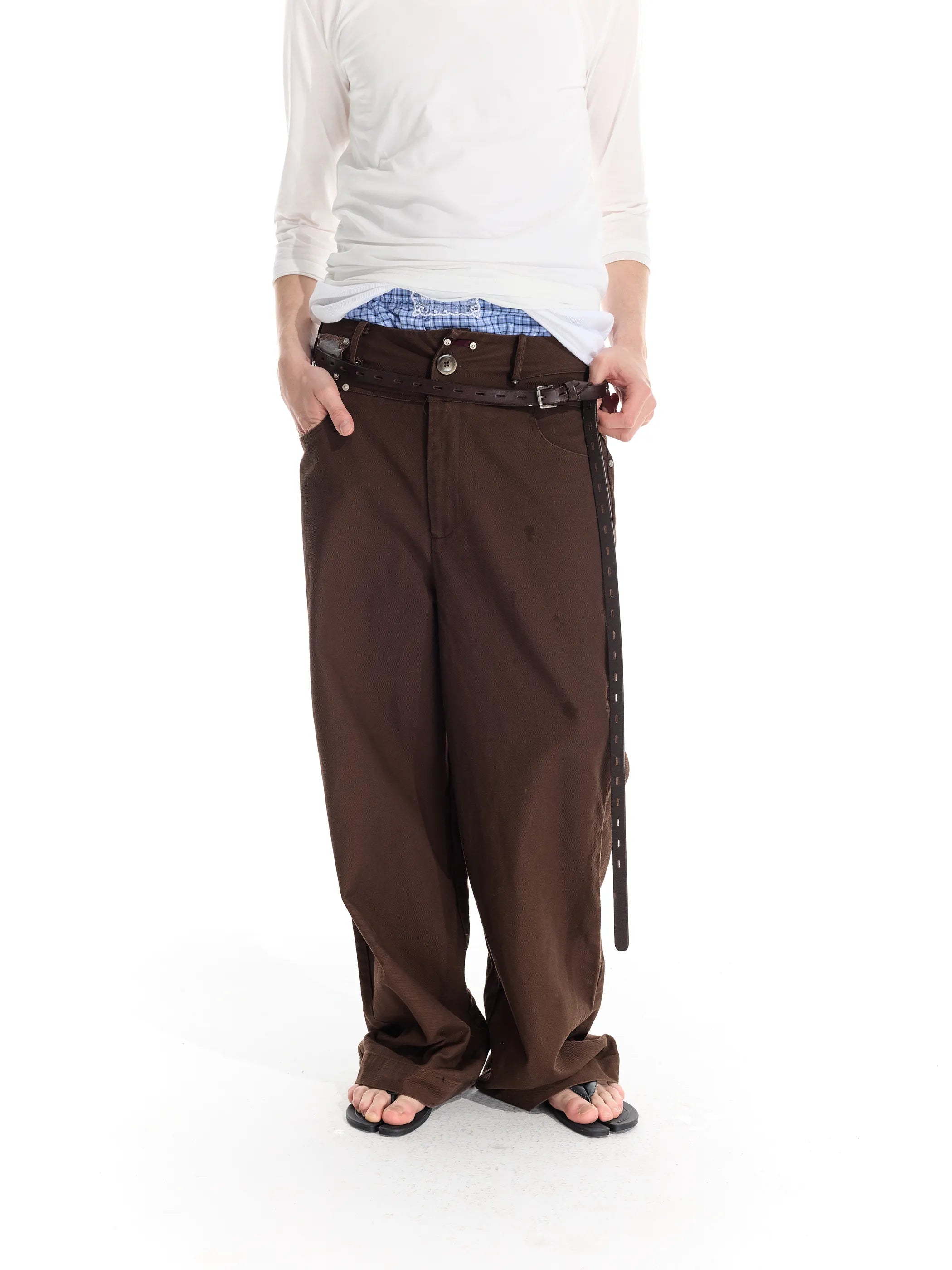 Riveted distressed straight-leg trousers