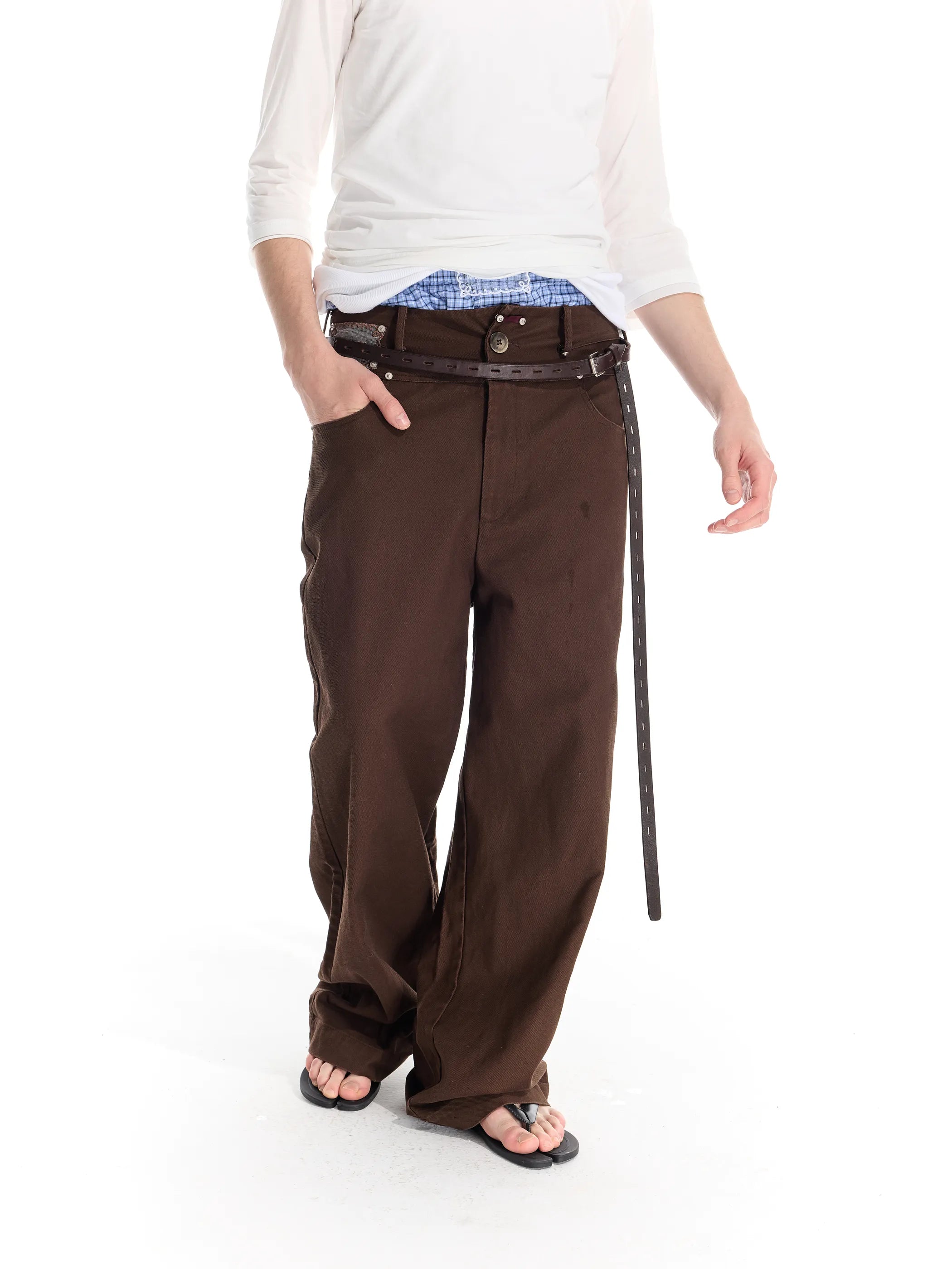 Riveted distressed straight-leg trousers