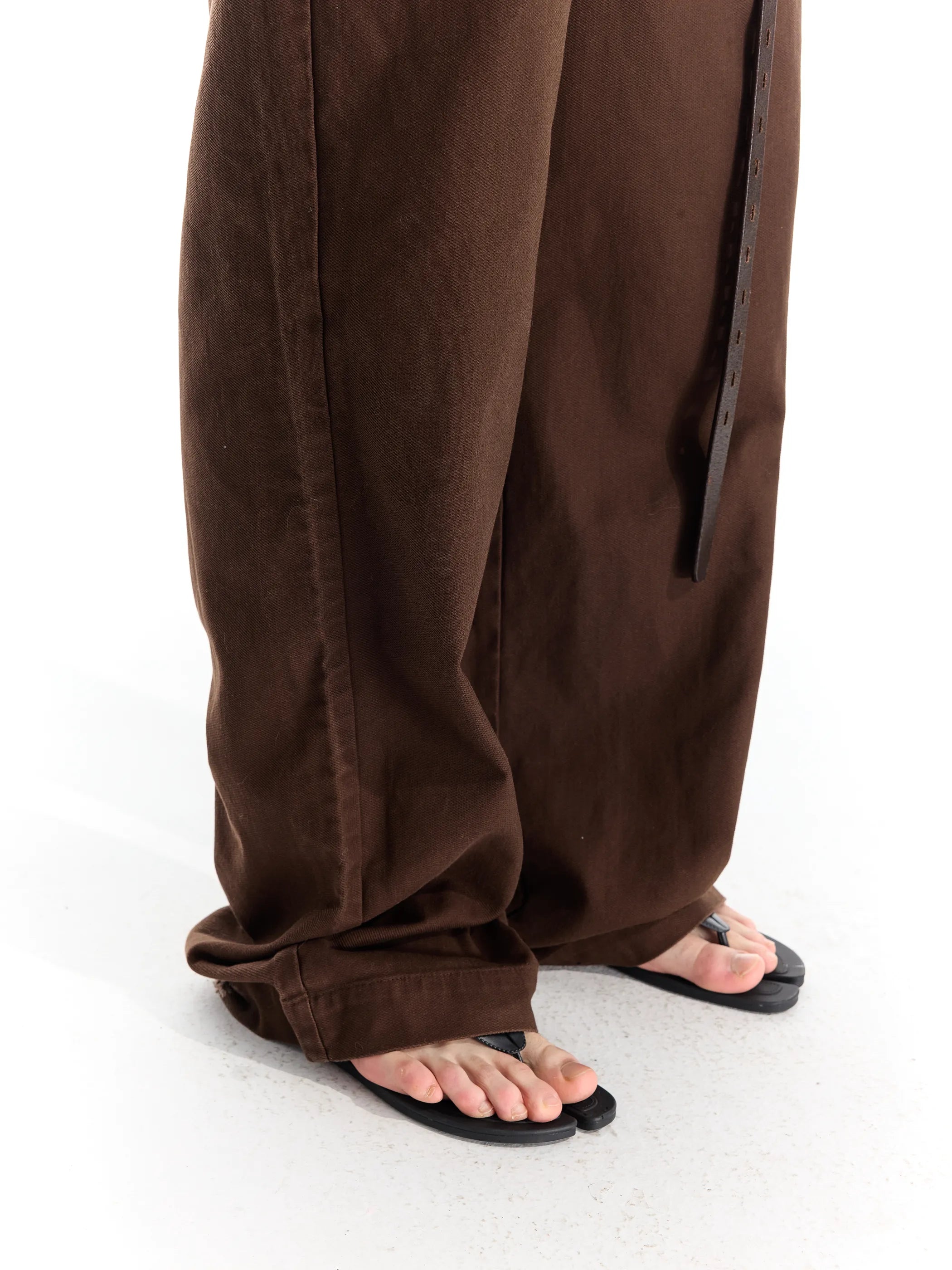 Riveted distressed straight-leg trousers