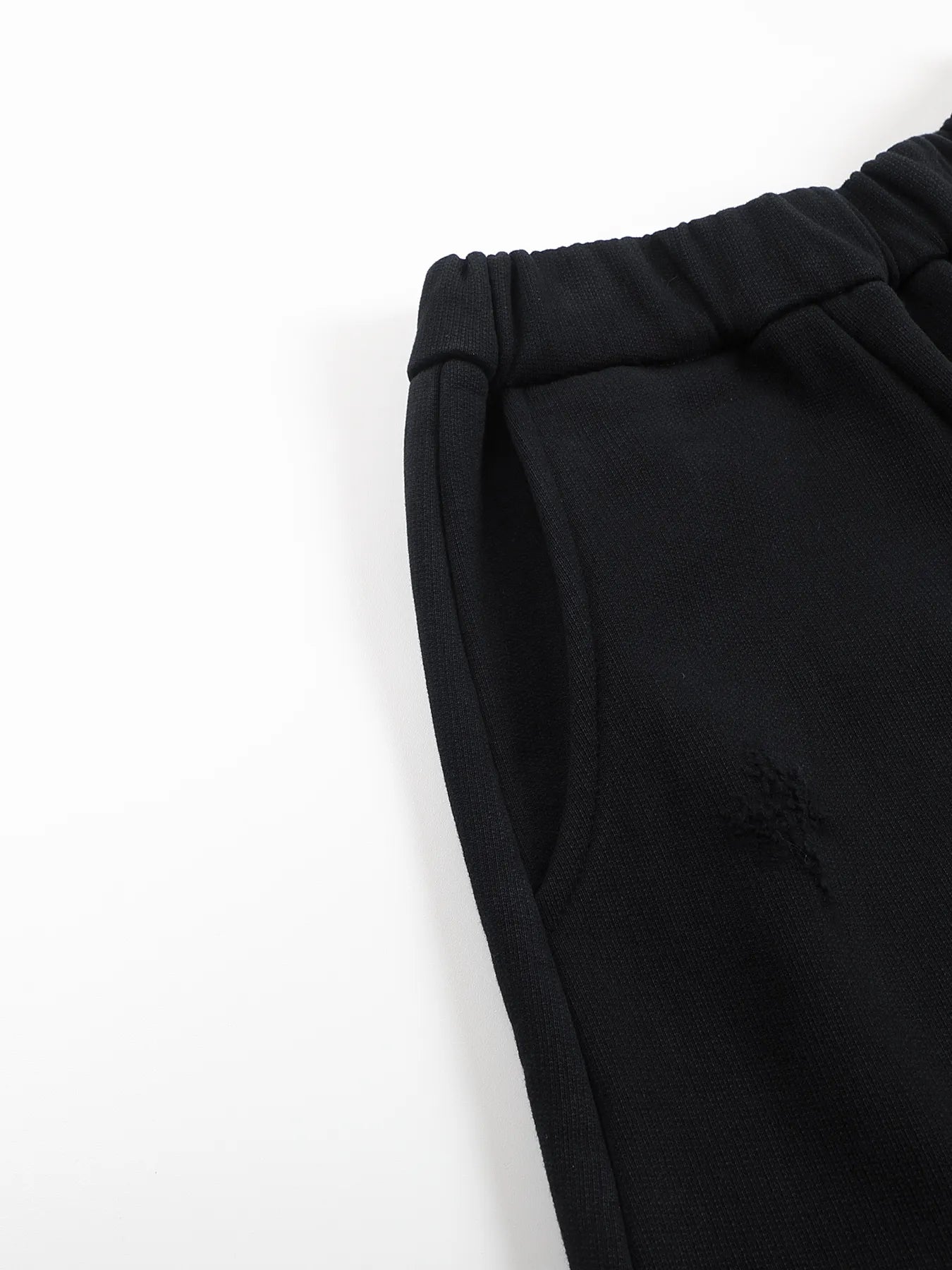Napoleon-style distressed sweatpants