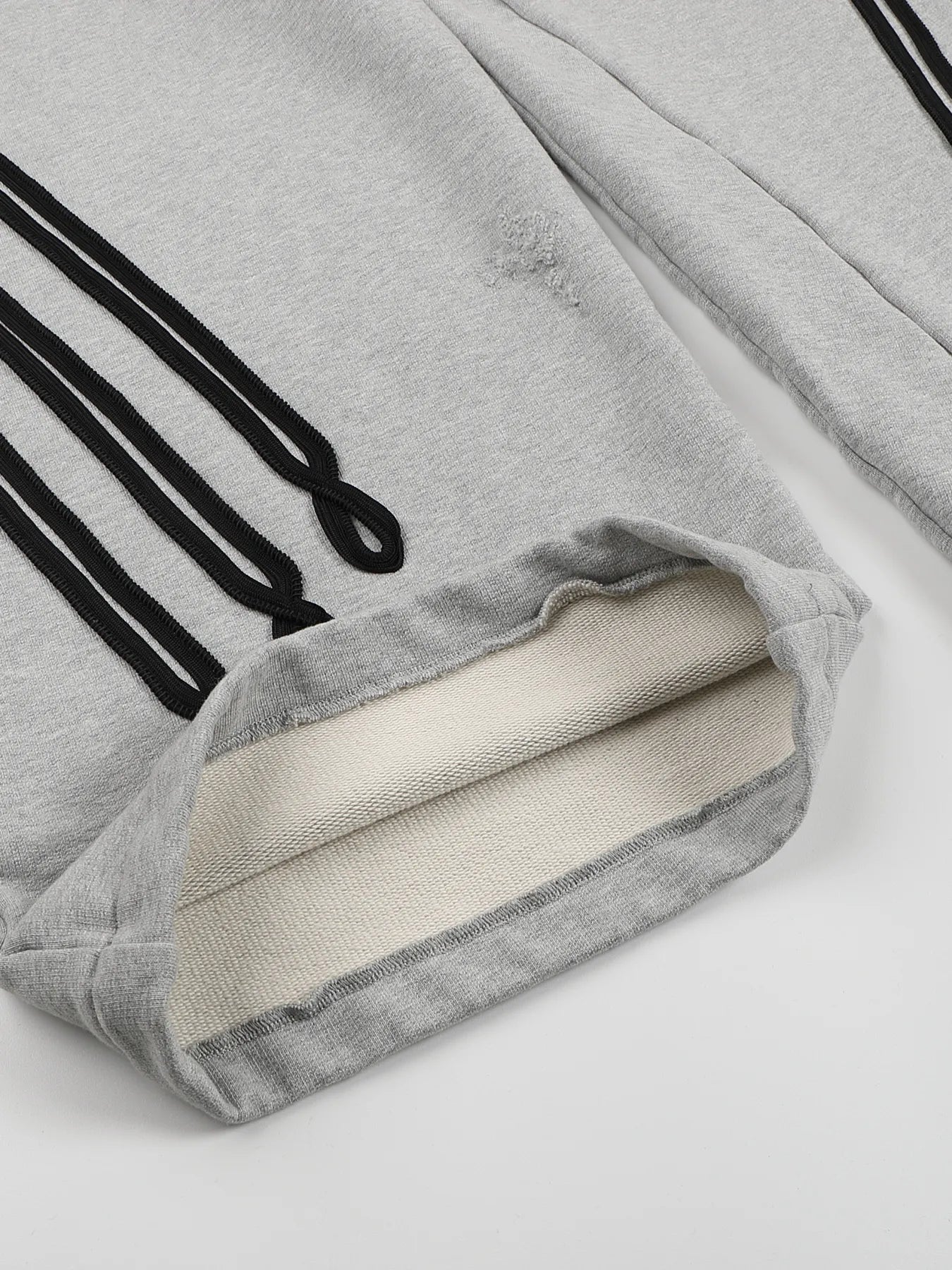 Napoleon-style distressed sweatpants