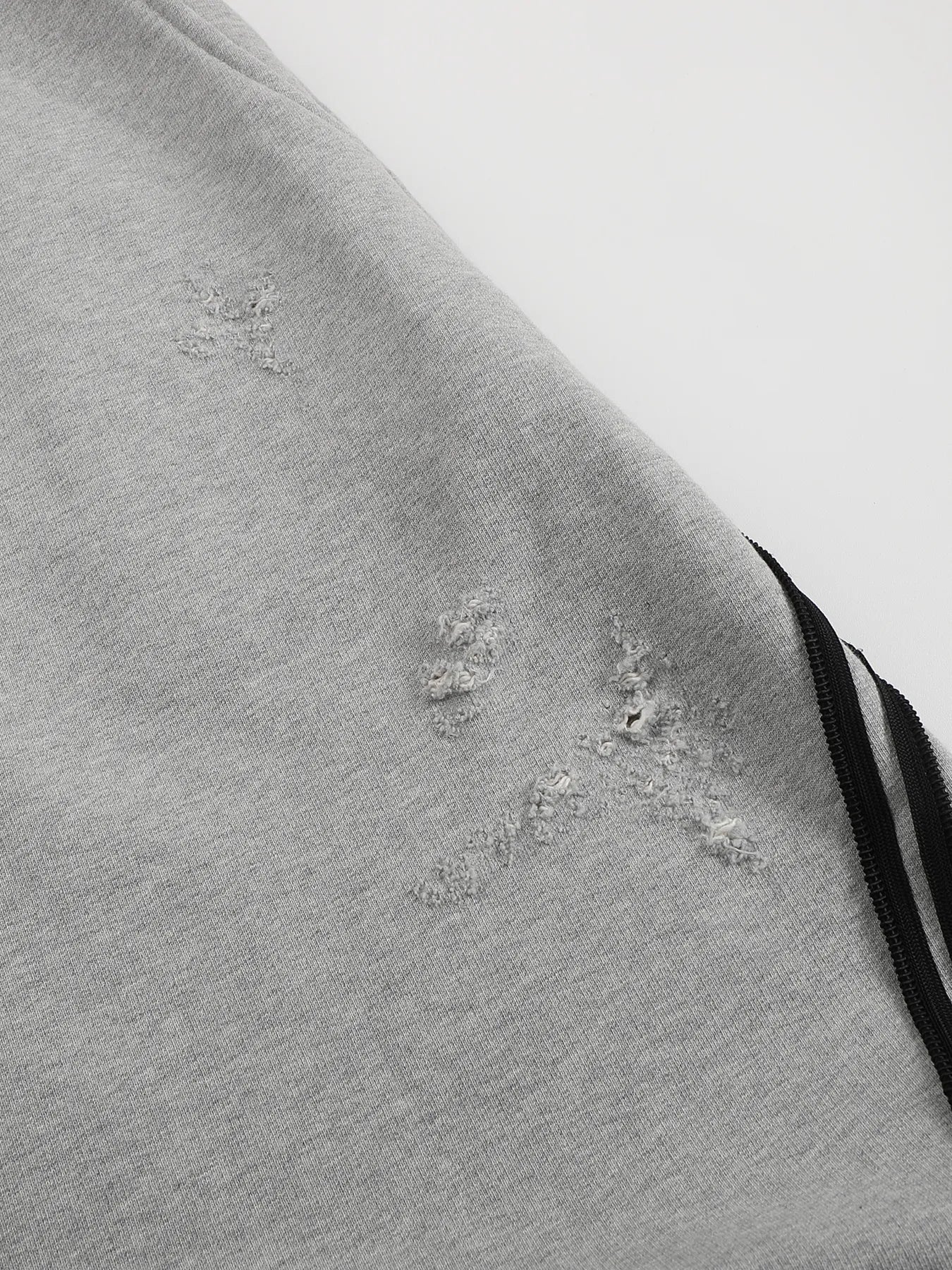 Napoleon-style distressed sweatpants