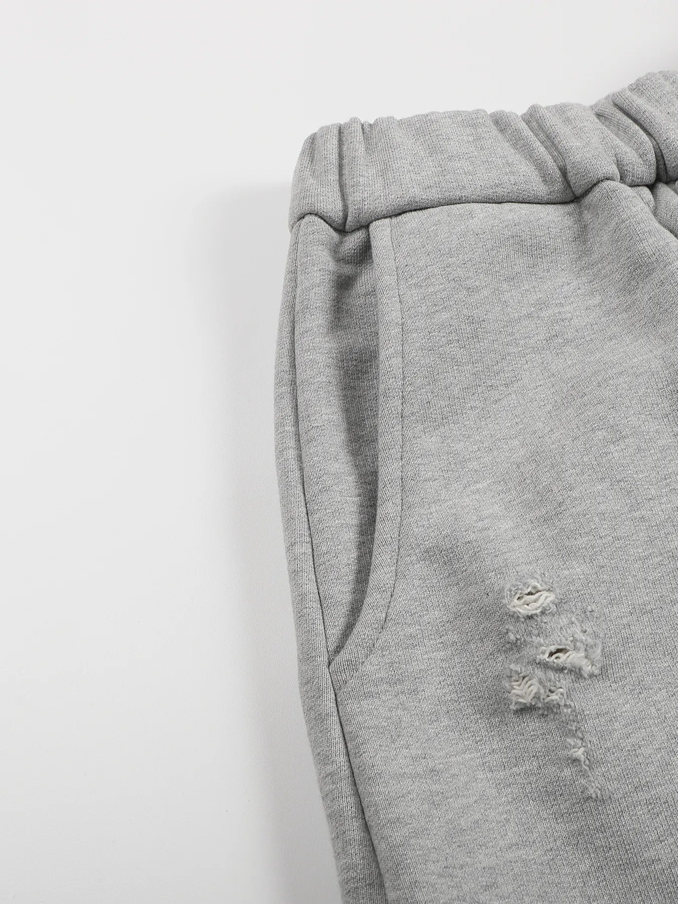Napoleon-style distressed sweatpants